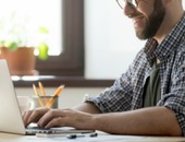 Happy male writing positive mail client 1163 3986